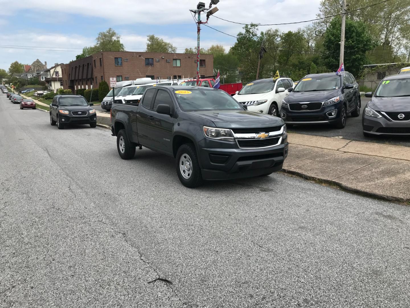 2015 Green /Gray Chevrolet Colorado Work Truck (1GCHSAEA4F1) with an 2.5 V4 engine, Automatic transmission, located at 577 Chester Pike, Prospect Park, PA, 19076, (610) 237-1015, 39.886154, -75.302338 - 2015 Chevrolet Colorado: Extended Cab (3-Door), remote start, backup camera, new PA inspection, runs LIKE NEW! This vehicle comes inspected and has been given a bumper to bumper safety check. It is very clean, reliable, and well maintained. We offer a unique pay plan that is known for being the e - Photo#1